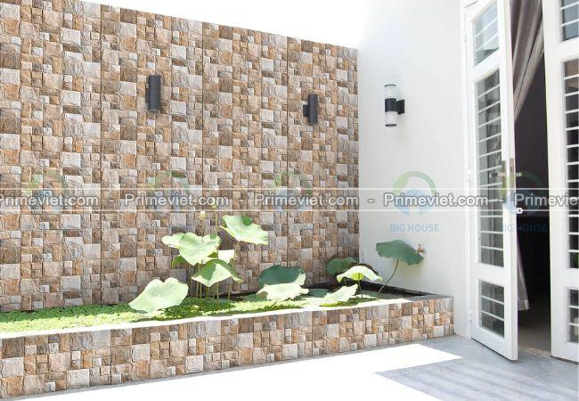 Mẫu gạch 30x45 TRG3409 giả đá tự nhiên được dùng để ốp trang trí tường rào và bồn cây gạch 30x45 TRG3409